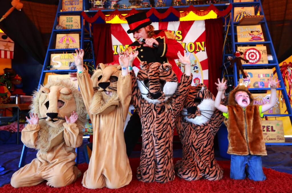 Circus Imagination Ringmaster Caton Raintree-Hegwer commands his circus animals to take a bow after their performance at the 2016 Cloverdale Citrus Fair on Friday. (JOHN BURGESS / The Press Democrat)