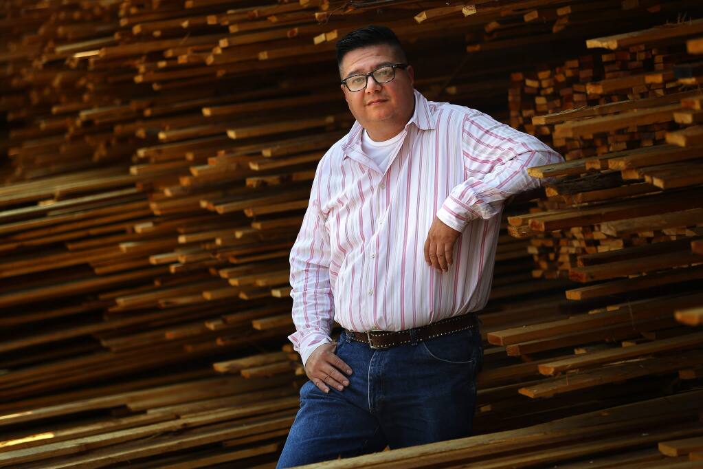 Robert Montes is the human resources and payroll director at Redwood Empire Sawmills, in Cloverdale. (Christopher Chung/ The Press Democrat)
