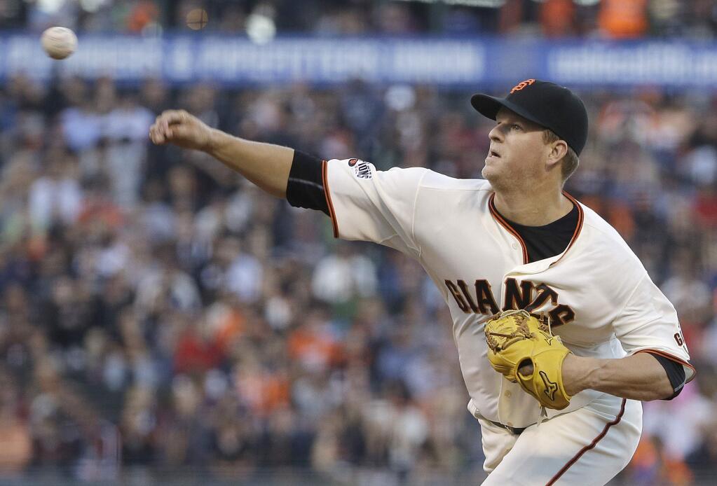 San Francisco Giants pitcher Matt Cain throws against the Milwaukee Brewers during the second inning of a baseball game in San Francisco, Tuesday, July 28, 2015. (AP Photo/Jeff Chiu)