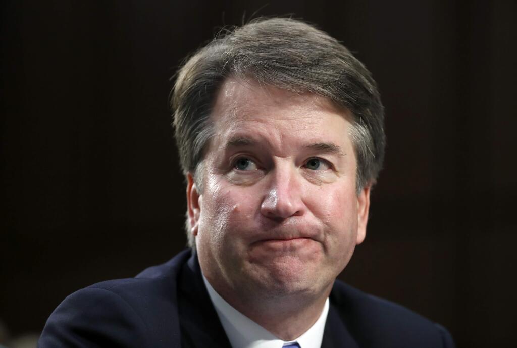 In this Sept. 6, 2018 photo, Supreme Court nominee Brett Kavanaugh reacts as he testifies after questioning before the Senate Judiciary Committee on Capitol Hill in Washington. (AP Photo/Alex Brandon)