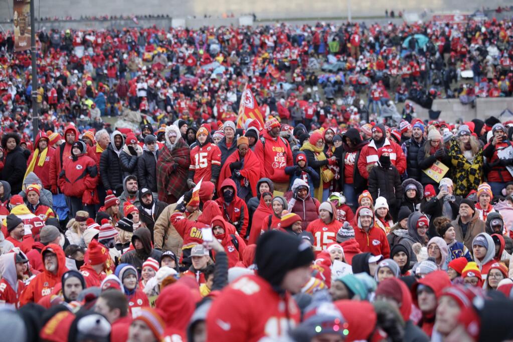 Kansas City Chiefs fans gather for a Super Bowl parade and rally in Kansas City, Mo., Wednesday, Feb. 5, 2020. (AP Photo/Orlin Wagner)