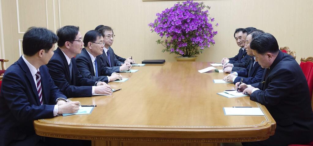 In this photo provided by South Korea Presidential Blue House via Yonhap News Agency, South Korean national security director, Chung Eui-yong, third from left, meets with North Korean vice chairman of North Korea's ruling Workers' Party Central Committee, Kim Yong Chol, second from right, in Pyongyang, North Korea, Monday, March 5, 2018. The envoys for South Korean President Moon Jae-in are on a rare two-day visit to Pyongyang that's expected to focus on how to ease a standoff over North Korea's nuclear ambitions and restart talks between Pyongyang and Washington. (South Korea Presidential Blue House/Yonhap via AP)