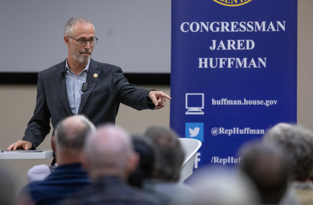 Congressman Jared Huffman (D-San Rafael) makes a point about taxes and fire recovery funds during a town meeting in Santa Rosa April 12, 2023. (Chad Surmick / The Press Democrat)