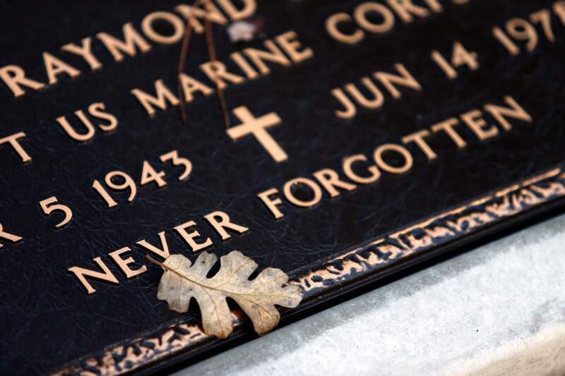 An oak leaf lays on the grave marker of Thomas Raymond San Filipo, a Marine Corps veteran who died in 1978, at the County of Sonoma Cemetery in Santa Rosa, California, on Saturday, December 1, 2018. (Alvin Jornada / The Press Democrat)