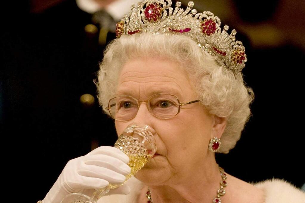 Queen Elizabeth, shown here demonstrating to her royal subjects that Champagne can be enjoyed just as easily without a plastic straw.