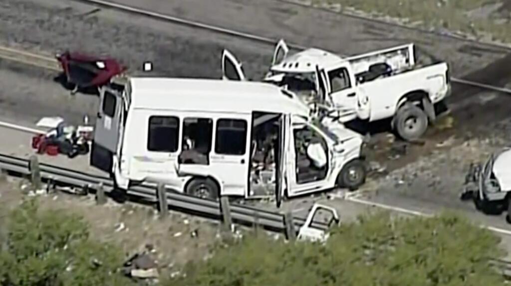 This aerial image made from a video provided by KABB/WOAI shows a deadly crash involving a van carrying church members and a pickup truck on U.S. 83 outside Garner State Park in northern Uvalde County, Texas, Wednesday, March 29, 2017. The group of senior adults from First Baptist Church of New Braunfels, Texas, was returning from a retreat when the crash occurred, a church statement said. (KABB/WOAI via AP) SAN ANTONIO OUT