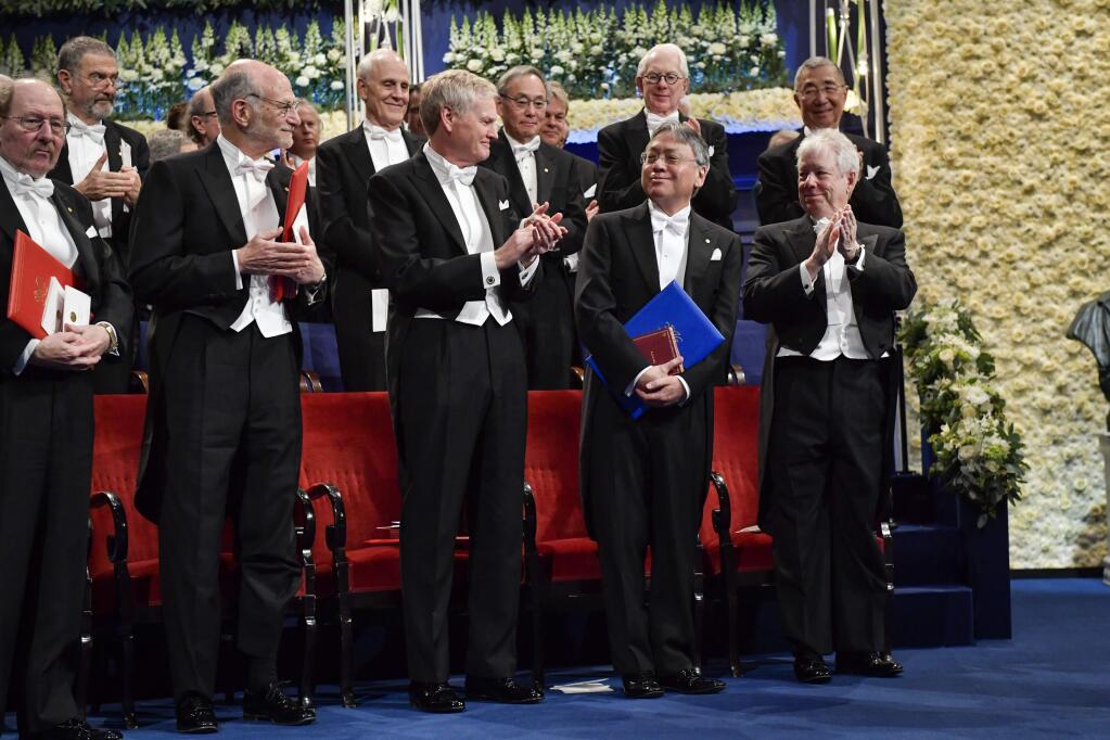 From left, Nobel Laureate in Physiology or Medicine Jeffrey Hall, Nobel Laureate in Physiology or Medicine Michael Rosbash, Nobel Laureate in Physiology or Medicine Michael Young, Nobel Laureate in Literature Kazuo Ishiguro and Nobel Laureate in Economics Richard Thaler attend the 2017 Nobel prize award ceremony at the Concert house in Stockholm, Sunday Dec. 10, 2017. (Fredrik Sandberg/TT News Agency)
