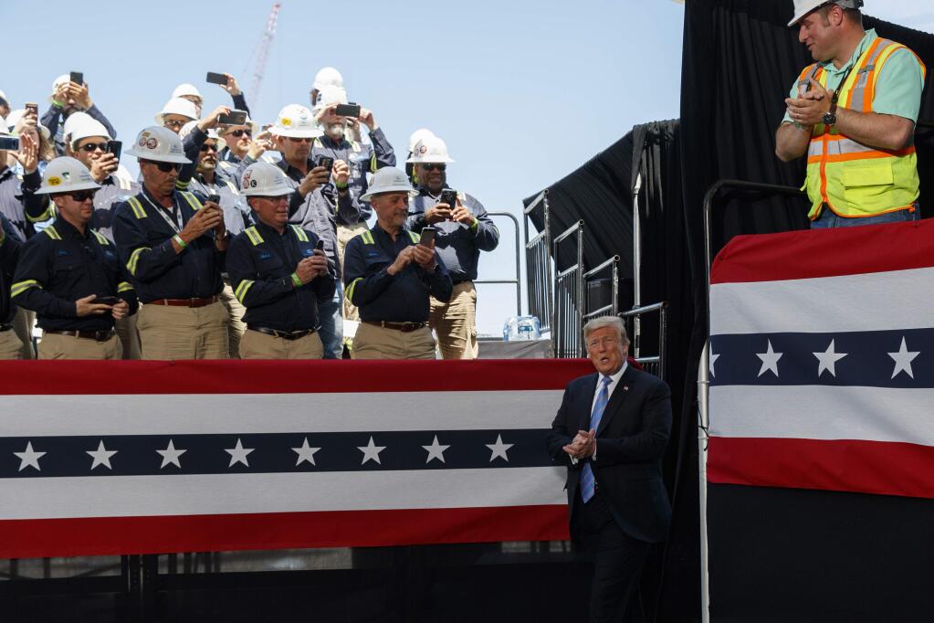 President Donald Trump arrives to speak on energy infrastructure at the Cameron LNG export facility, Tuesday, May 14, 2019, in Hackberry, La. (AP Photo/Evan Vucci)