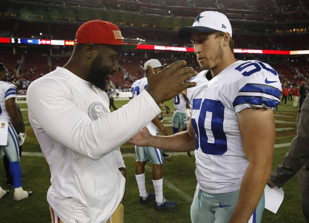49ers linebacker NaVorro Bowman, left, greets Dallas Cowboys linebacker Sean Lee after they're meeting in an exhibition game last August. (Tony Avelar / Associated Press)