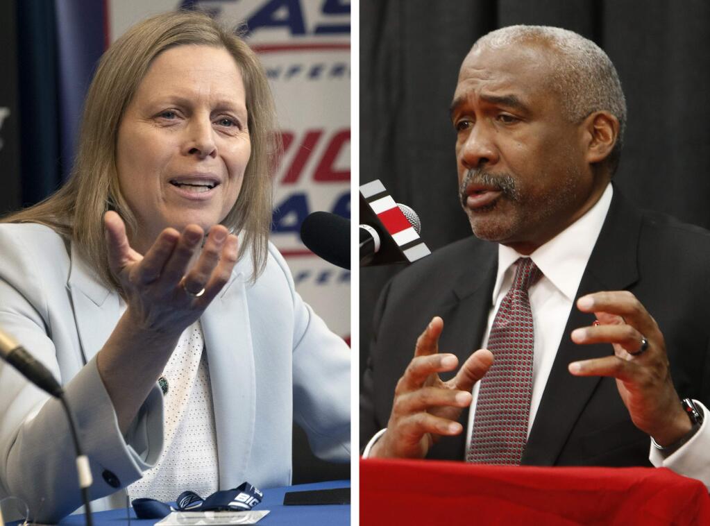 FILE - At left, in a March 12, 2020, file photo, Big East Conference Commissioner Val Ackerman speaks to reporters in New York. At right, in a Dec. 4, 2018, file photo, Ohio State athletics director Gene Smith answers questions during a news conference in Columbus, Ohio. The NCAA announced Wednesday, April 29, 2020, that its Board of Governors supports a plan that gives athletes the ability to cash in on their names, images and likenesses as never before and without involvement from the association, schools or conferences. The board on Monday and Tuesday, April 27-28, 2020, reviewed detailed recommendations put forth by a working group led by Ohio State athletic director Gene Smith and Big East Commissioner Val Ackerman. (AP Photo/File)