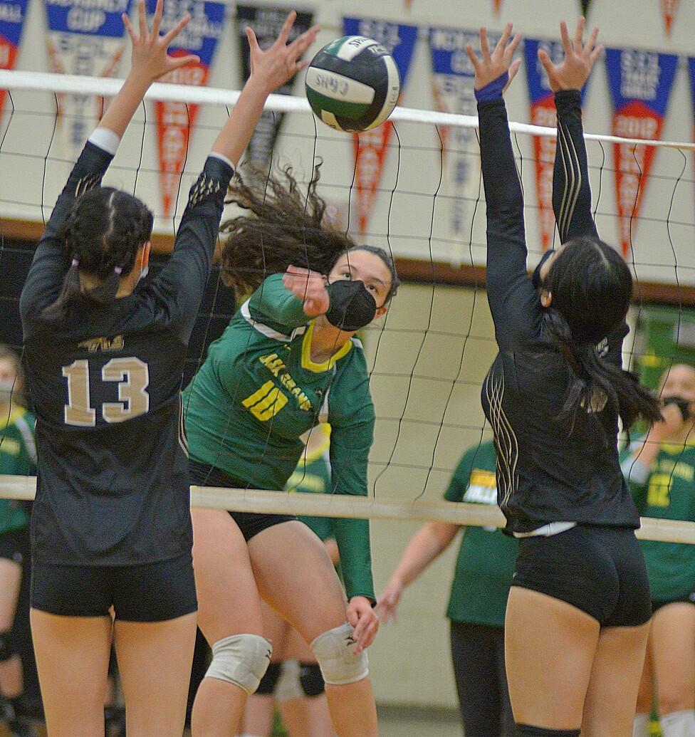Casa Grande’s Bella Blue (10) hits through a pair of American Canyon defenders in a match won by Casa 3-1 (SUMNER FOWLER/FOR THE ARGUS-COURIER)