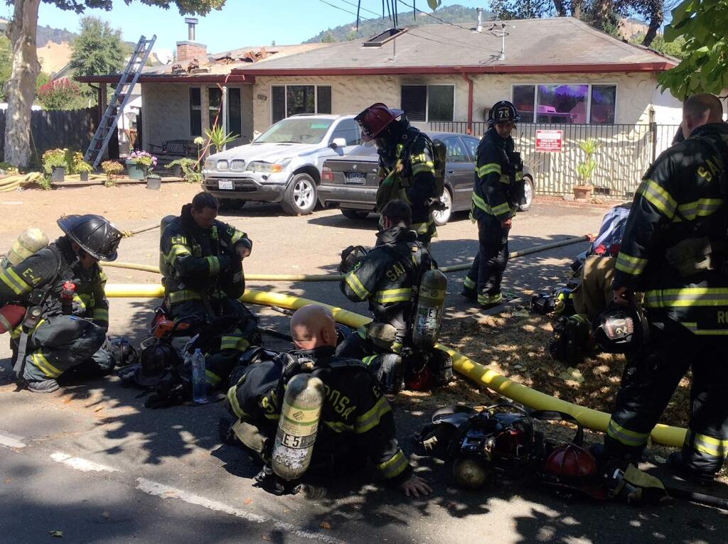 Firefighters battle a blaze on Benjamins Road in Santa Rosa on Monday, Sept. 10, 2018. (KENT PORTER/ PD)