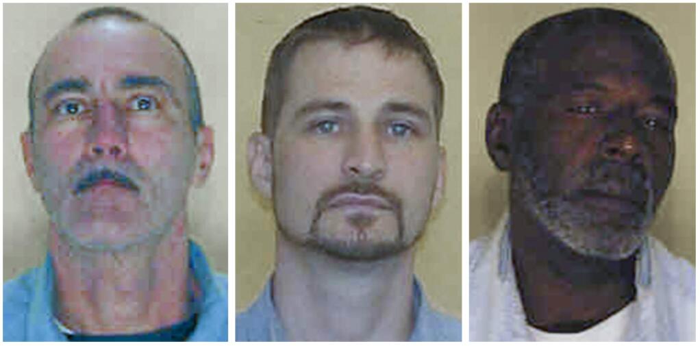 This combination of booking photos provided by the Ohio Department of Rehabilitation and Correction shows: Adam Taylor, left, Joel David Hamlin, center, and William Coffman. The Columbus Police Department recruited the inmates with the help of the state prisons agency to produce an educational YouTube video for the public in which the offenders shared their how-to tips on how to prevent burglaries. (Ohio Department of Rehabilitation and Correction via AP)
