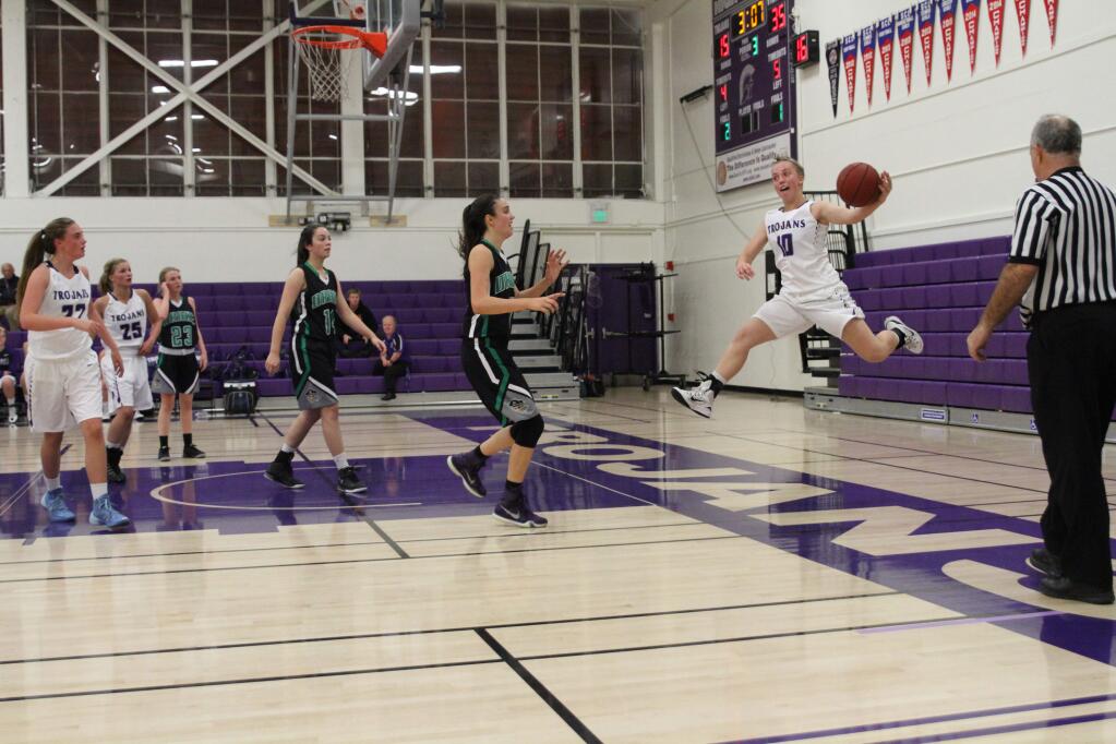 DWIGHT SUGIOKA/FOR THE ARGUS-COURIERPetaluma's Emily Corda attempts to save a ball from going out of bounds during the T-Girls game against Drake.