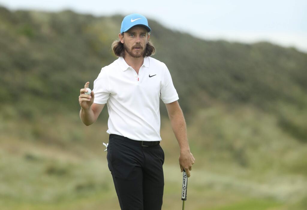 England's Tommy Fleetwood reacts after he saves parr on the 15th green during the third round of the British Open Golf Championships at Royal Portrush in Northern Ireland, Saturday, July 20, 2019.(AP Photo/Jon Super)