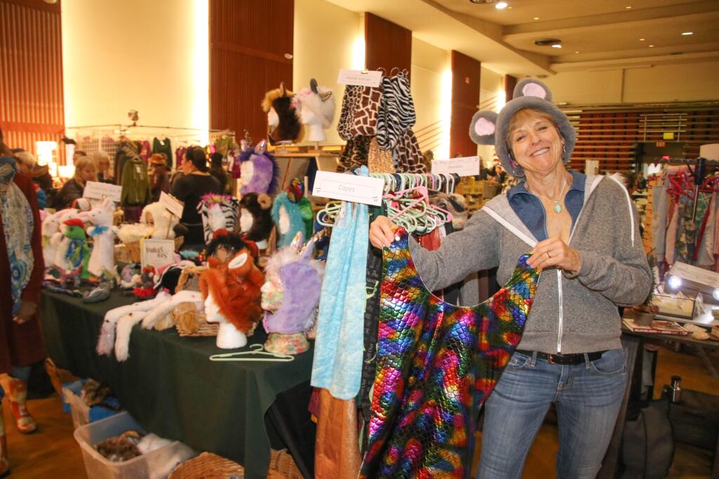 Babs Kavanaugh hold up her fabulous creations at the 11th annual Holiday Crafterino held on Dec 1, 2019 at The Veteran's Memorial building in Petaluma. Photo by Victoria Webb