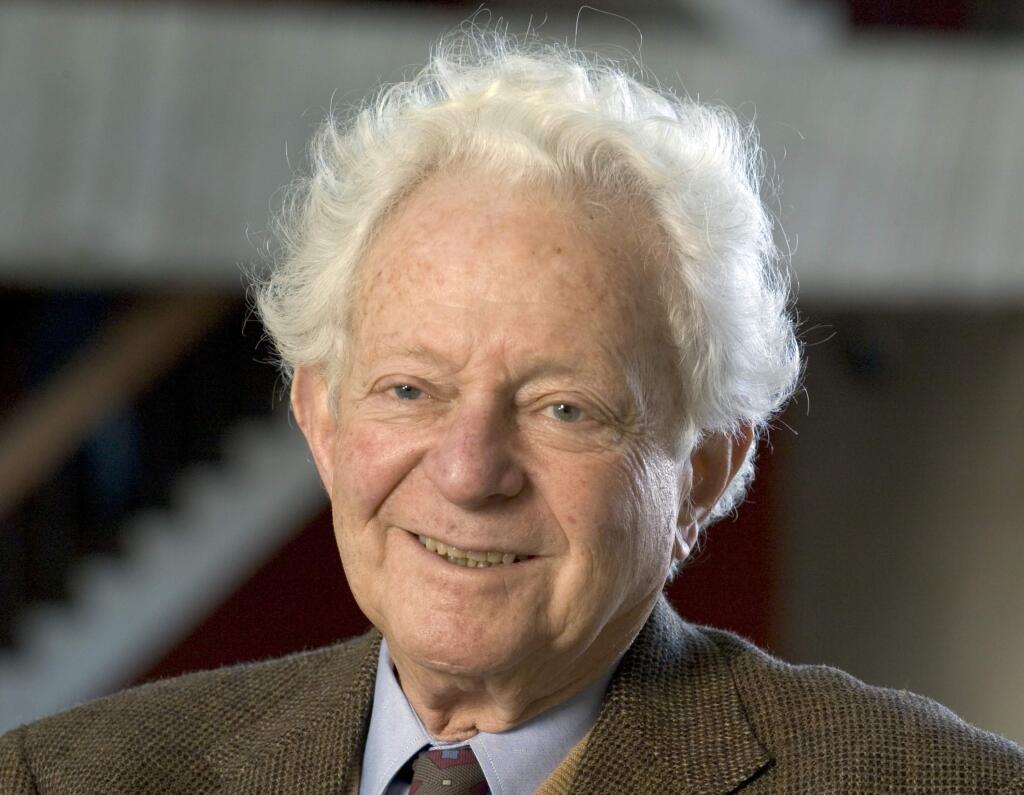 FILE - In this Nov. 2014, file photo provided by Fermilab, Physics Nobel Prize winner Dr. Leon M. Lederman poses for a photo in Batavia, Ill. Lederman, an experimental physicist who won a Nobel Prize in physics for his work on subatomic particles and coined the phrase 'God particle,' has died. Ellen Carr Lederman, his wife of 37 years, said her husband died Wednesday, Oct. 3, 2018, at a nursing home in the Idaho town of Rexburg. He was 96. (Reidar Hahn, Fermilab via AP, file)