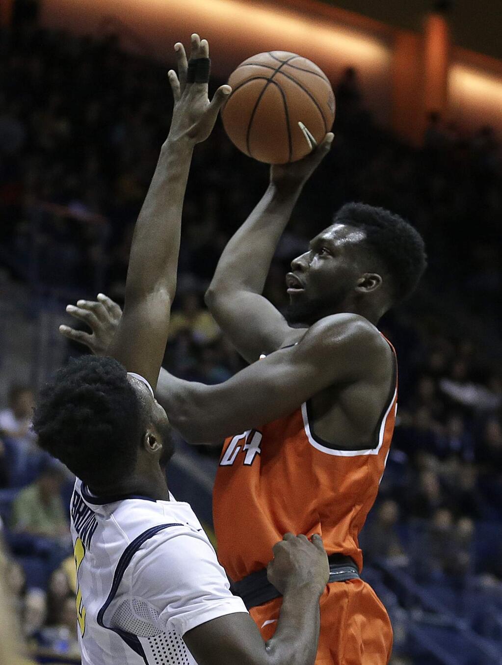 Sam Houston State's Torry Butler, right, shoots over California's Jaylen Brown in the first half of an NCAA college basketball game Monday, Nov. 23, 2015, in Berkeley, Calif. (AP Photo/Ben Margot)