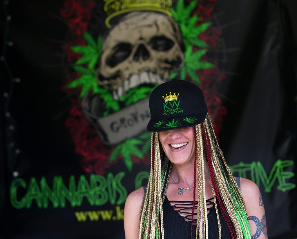 Nikki Taylor with King Weedy from Washington D.C. at the 17th annual Emerald Cup festival at the Sonoma County Fairgrounds on Saturday, December 9, 2017. (photo by John Burgess/The Press Democrat)