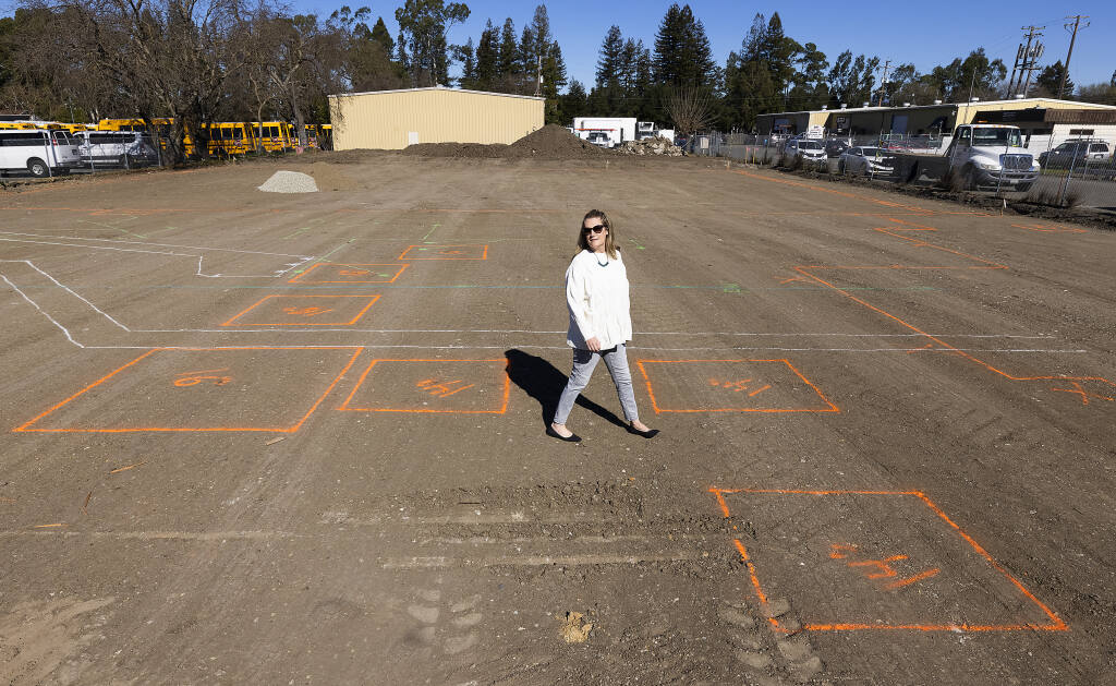 Boys & Girls Clubs of Sonoma-Marin CEO Jennifer Weiss walks on the layout for a new $17 million, 25,000-square-foot center on Sebastopol Road in Roseland on Tuesday, February 15, 2022. The center will include a full size gym, art/stem lab, dance studio, cooking kitchen, a teen center, community rooms and spaces for character and leadership and health and wellness programming. (Photo by John Burgess/The Press Democrat)