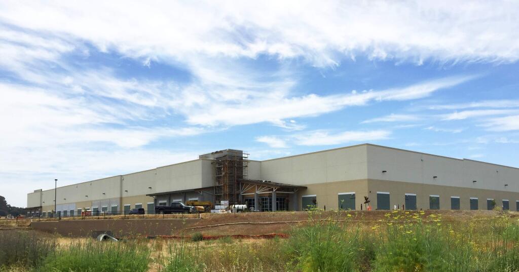 The exterior of the 226,000-square-foot first warehouse in the Greenwood Business Park development in south Napa nears completion June 17, 2015. Windsor-based Pack n' Ship Direct has reserved the entire building for its Napa Valley expansion. (DTZ)