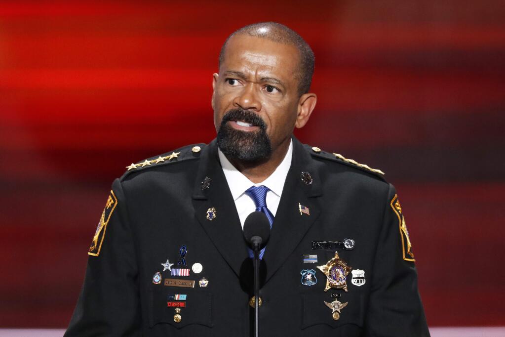FILE - In this July 18, 2016, file photo, Milwaukee County, Wis. Sheriff David Clarke speaks at the Republican National Convention in Cleveland. The Department of Homeland Security says Milwaukee Clarke is no longer a candidate for a position in the agency. In May 2017 Clarke said he was taking a job as an assistant secretary in DHS. But a political adviser to Clarke says the sheriff notified DHS Secretary John Kelly late Friday, June 16, 2017, that he 'had rescinded his acceptance of the agency's offer' to join DHS. Clarke says he believes he could help promote President Donald Trump's agenda 'in a more aggressive role.' (AP Photo/J. Scott Applewhite, File)