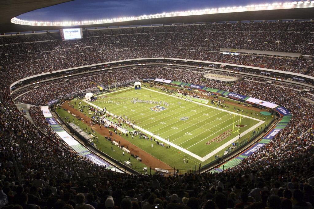 FILE - In this Oct. 2, 2005, file photo, Azteca Stadium in Mexico City, Mexico is shown prior to the start of a regular season NFL game between the Arizona Cardinals and San Francisco 49ers. Eleven years after the network telecast an NFL game from Mexico City, it will do so again when the Raiders 'host' the Texans on Monday night. (AP Photo/Marco Ugargte, File)
