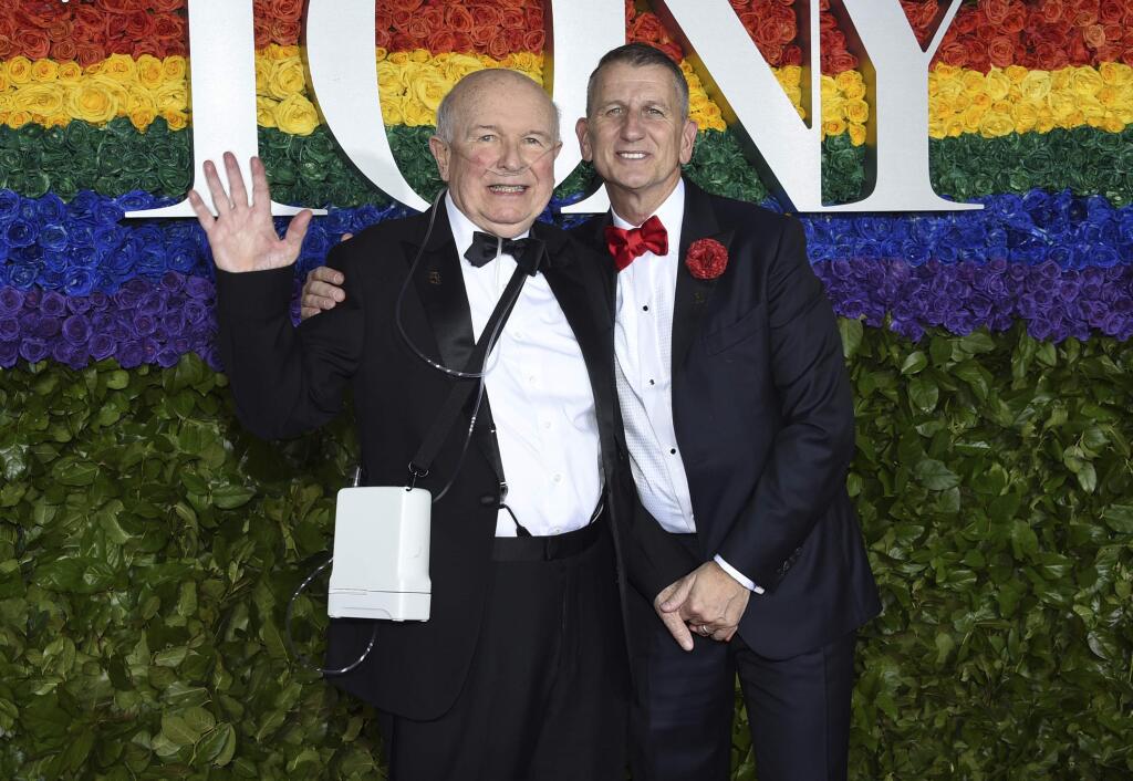 FILE - This June 9, 2019 file photo shows playwright Terrence McNally, left, and Tom Kirdahy at the 73rd annual Tony Awards in New York. McNally, one of America's great playwrights whose prolific career included winning Tony Awards for the plays 'Love! Valour! Compassion!' and 'Master Class' and the musicals 'Ragtime' and 'Kiss of the Spider Woman,' died Tuesday, March 24, 2020, of complications from the coronavirus. He was 81. (Photo by Evan Agostini/Invision/AP, File)
