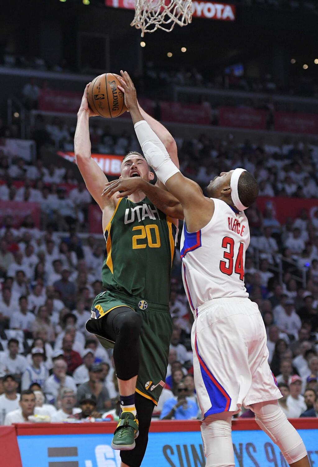 Utah Jazz forward Gordon Hayward, left, shoots as Los Angeles Clippers forward Paul Pierce defends during the first half in Game 7 of an NBA basketball first-round playoff series, Sunday, April 30, 2017, in Los Angeles. (AP Photo/Mark J. Terrill)