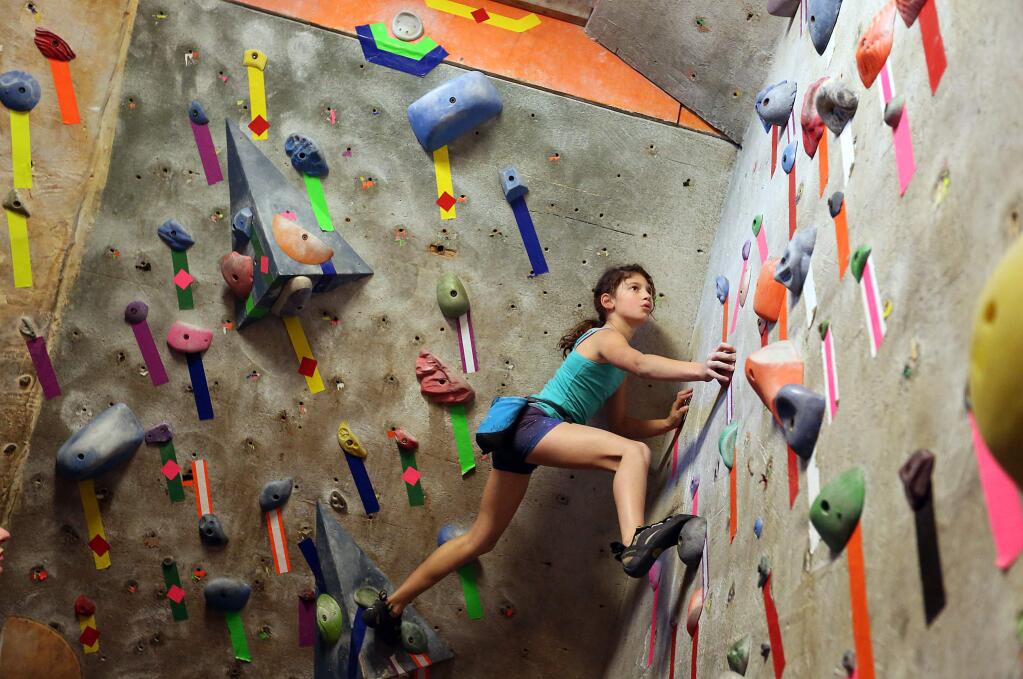 Eva Abert, 10, prepares for nationals at Vertex Climbing Center in Santa Rosa, Thursday, January 29, 2015. (Crista Jeremiason / The Press Democrat)