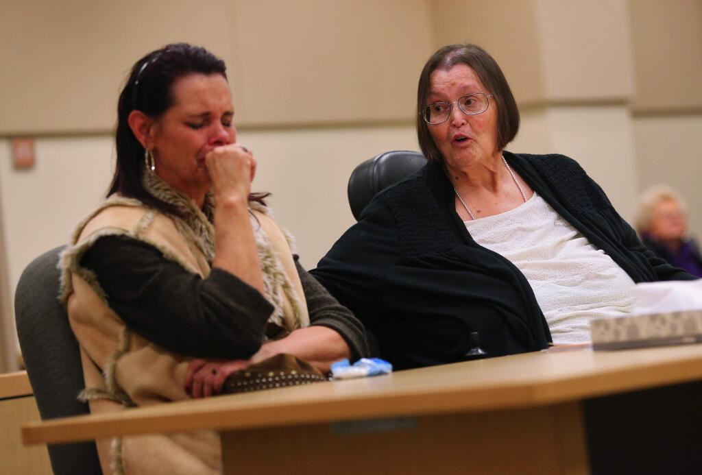 Legal Aid of Sonoma County attorney Barbara Sherrill comforts defendant Tina Cruz at the conclusion of her case at the Sonoma County Civil and Family Law Court.