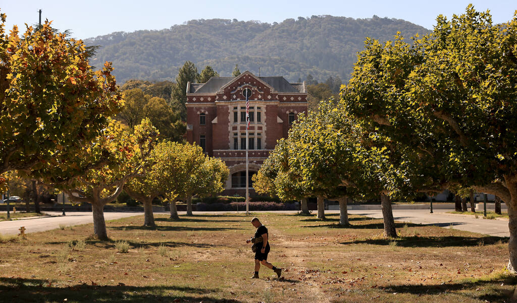 At the Sonoma Developmental Center, Wednesday, Oct. 19, 2022 in Glen Ellen, a Northern California National Guard 95th Civil Support Team member walks across the median of the campus, during a simulated disaster exercise.  (Kent Porter / The Press Democrat) 2022