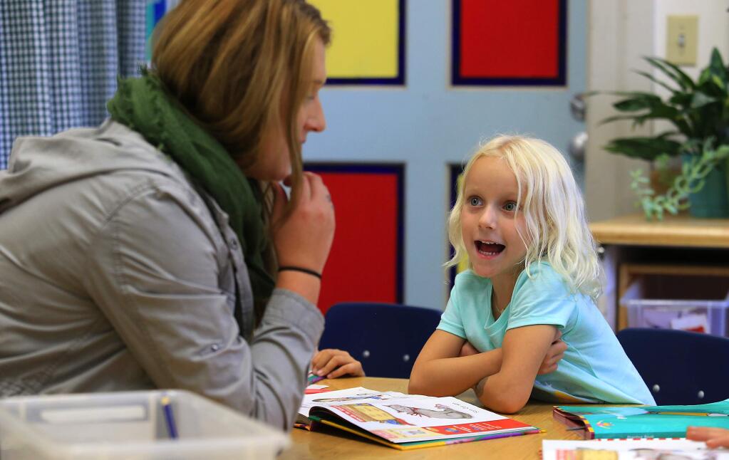 Aide Hannah Early works with Hayden Hess, the only kindergartener at Union School, a 120-year-old, one-room schoolhouse outside of Petaluma. (JOHN BURGESS/The Press Democrat)