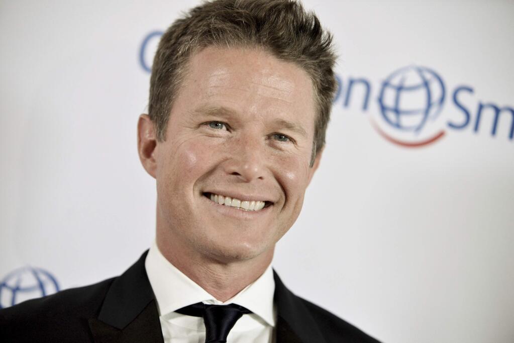 FILE - In this Sept. 19, 2014 file photo, Billy Bush arrives at the Operation Smile's 2014 Smile Gala in Beverly Hills, Calif. Bush, who was fired after an old video emerged of him engaging in offensive sex talk with then 'Apprentice' host Donald Trump, said in an op-ed published in The New York Times on Sunday, Dec. 3, 2017, that it was indeed Trump's voice captured on a 2005 'Access Hollywood' tape. (Photo by Richard Shotwell/Invision/AP, File)