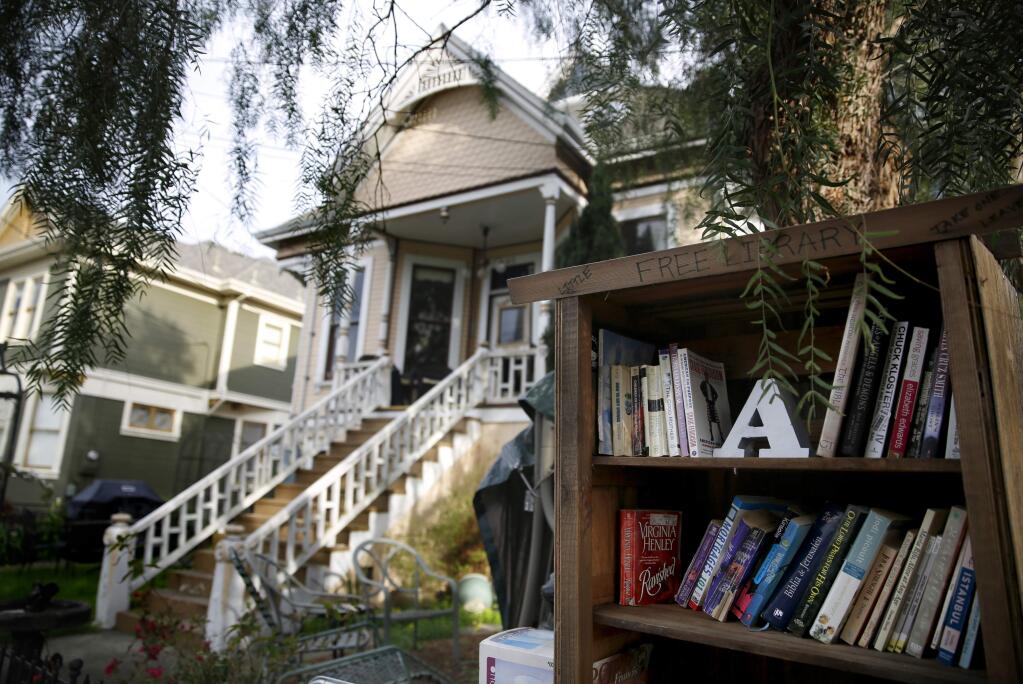 PHOTO: 1 by The Press Democrat, file-LENDING A BOOK: Some free library locations include, clockwise from top, Saint Helena Street in Santa Rosa; A Street in Petaluma; in front of The Sitting Room in Penngrove, and Main Street in Sebastopol.