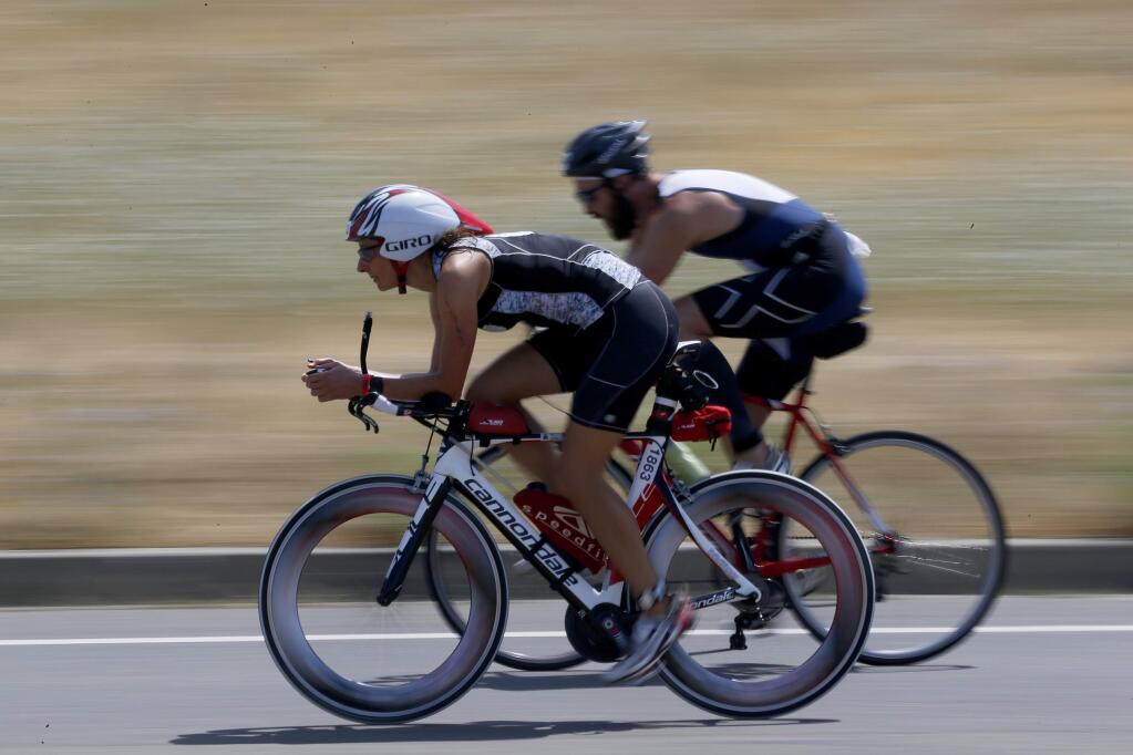Stacy Johns competes during the IRONMAN 70.3 Vineman Triathlon on Sunday, July 12, 2015 in Windsor, California . (BETH SCHLANKER/ The Press Democrat)