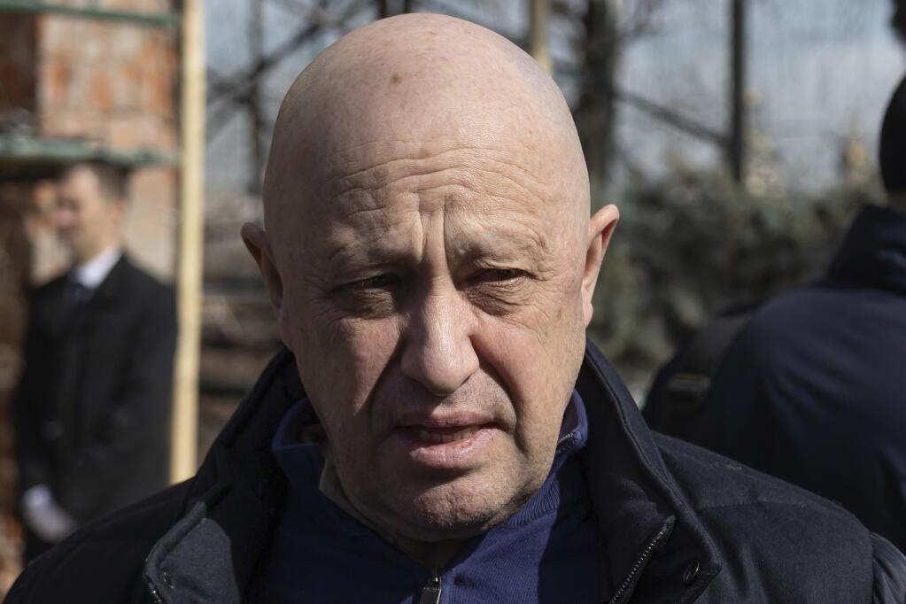 FILE - Yevgeny Prigozhin, the owner of the Wagner Group military company, arrives during a funeral ceremony at the Troyekurovskoye cemetery in Moscow, Russia, Saturday, April 8, 2023. Prigozhin is threatening to pull his troops out of the protracted battle for the eastern Ukraine city of Bakhmut next week. He accused Russia’s military command Friday, May 5 of starving his forces of ammunition and rendering them unable to fight. (AP Photo, file)