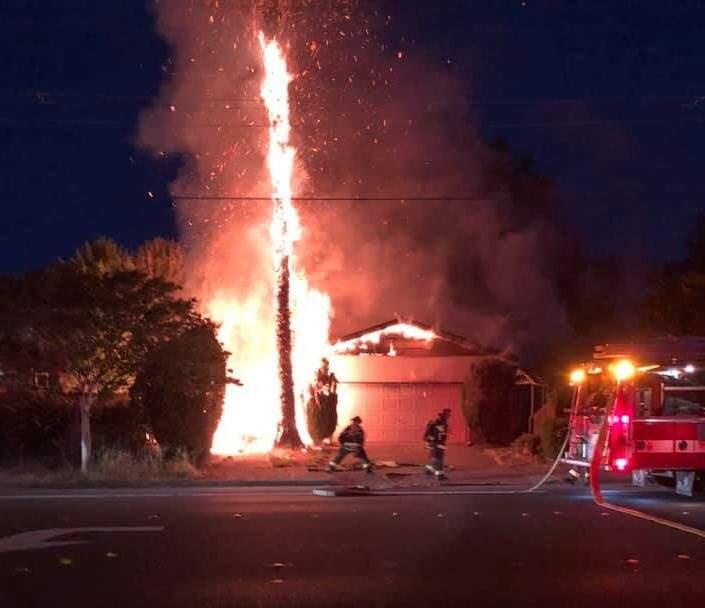 Flames damaged the exterior of the home, the garage and attic, but fire crews were able to prevent the spread of the fire into the living area and saved the family's belongings. (Courtesy of Santa Rosa Fire Dept.)
