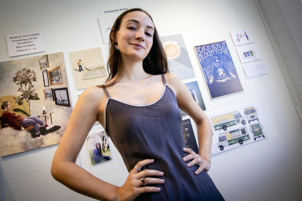 SVHS graduate and local artist Rue Gobbée standing in from of her award-winning graphic designs at the Arts Guild of Sonoma on East Napa Street Wednesday, August 10, 2022.  (Robbi Pengelly/Index-Tribune)