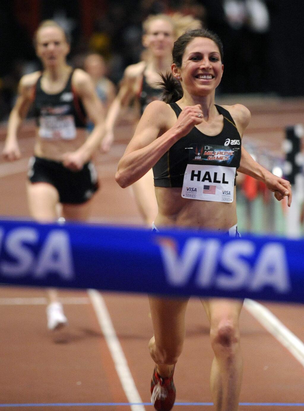American Sara Hall wins the Women's 1500 Meter Run at the 2011 Millrose Games in Madison Square Garden in New York, Friday, Jan. 28, 2011. (AP Photo/Henny Ray Abrams)