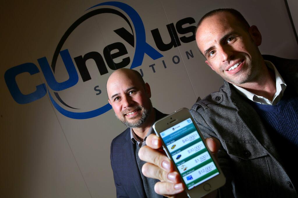 CUneXus Solutions president David Buerger, right, and vice president Darin Chong developed technology for lenders to make pre-approved offers customized on a variety of loans to consumers.(Christopher Chung/ The Press Democrat)