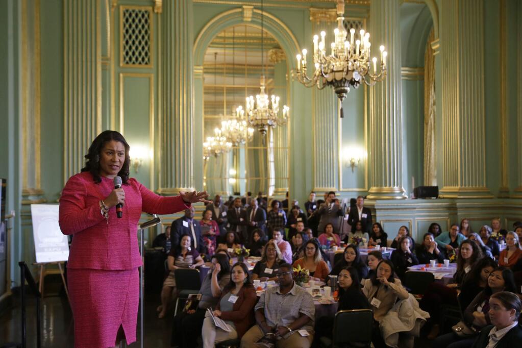 In this photo taken Friday, Nov. 1, 2019, San Francisco Mayor London Breed gestures while speaking at the annual Women In Construction Expo in San Francisco. San Francisco's mayor faces easy re-election in Tuesday's election but a hefty list of problems to solve, including a homelessness crisis, drug epidemic and a housing shortfall. The former president of the Board of Supervisors narrowly won a special June 2018 election to fill the seat left vacant by the sudden death of Mayor Ed Lee. (AP Photo/Eric Risberg)