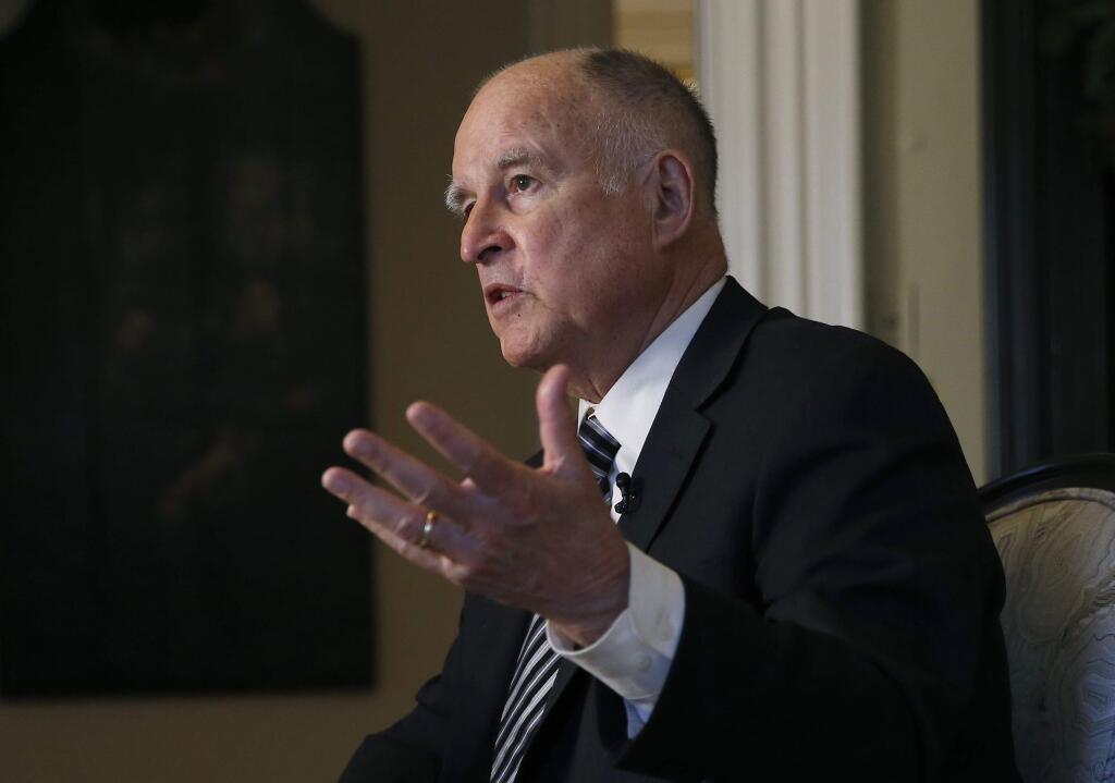 Former Gov. Jerry Brown called Republicans 'flat Earth' science deniers during a recent appeareance before the House Overisght Committee in Washington. (RICH PEDRONCELLI / Associated Press)