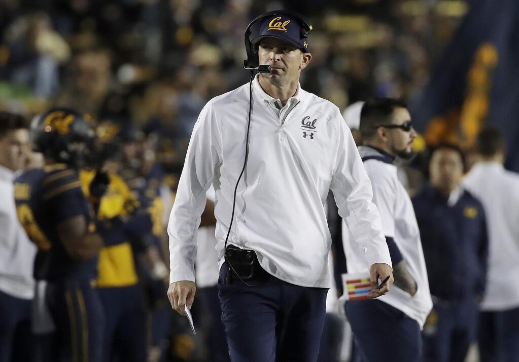In this Nov. 24, 2018, file photo, Cal head coach Justin Wilcox walks on the sideline during the first half against Colorado in Berkeley. AP Photo/Jeff Chiu, File)