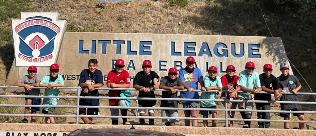 Petaluma National Little League All Stars say good by to San Bernardino after coming to within one win of advancing to the Little League World Series. (ESTHER OKAMURA PHOTO)