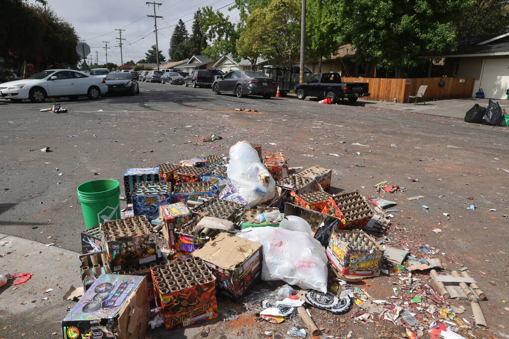 Spent fireworks litter the intersection of Beachwood and Greenwood Drive, in Santa Rosa on Monday, July 5, 2021.  (Christopher Chung/ The Press Democrat)