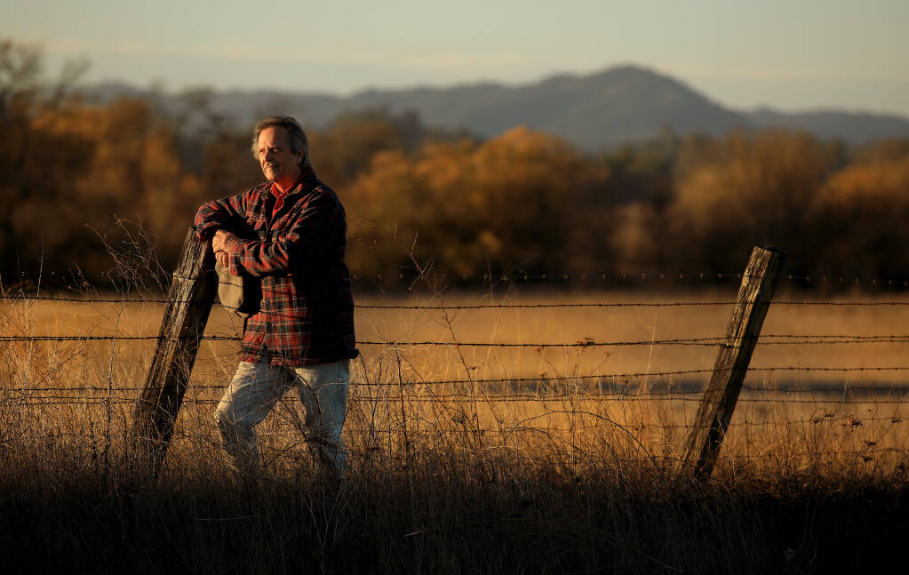 Artist Richard McDaniel stands in one his favorite areas in the Russian River watershed, the Laguna de Santa Rosa, on Thursday, Dec. 8, 2020 (Kent Porter / The Press Democrat)