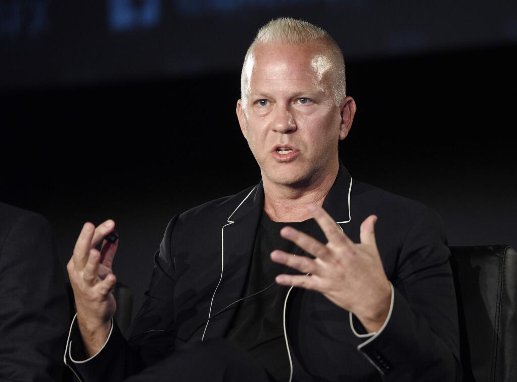 FILE - In this Aug. 9, 2017 file photo, Ryan Murphy, the executive producer/writer/director of 'The Assassination of Gianni Versace: American Crime Story,' takes part in a panel discussion on the FX series during the 2017 Television Critics Association Summer Press Tour in Los Angeles. Murphy is expanding his empire to Netflix.The streaming service says Murphy signed a deal to produce new series and films exclusively for it starting in July. (Photo by Chris Pizzello/Invision/AP, File)