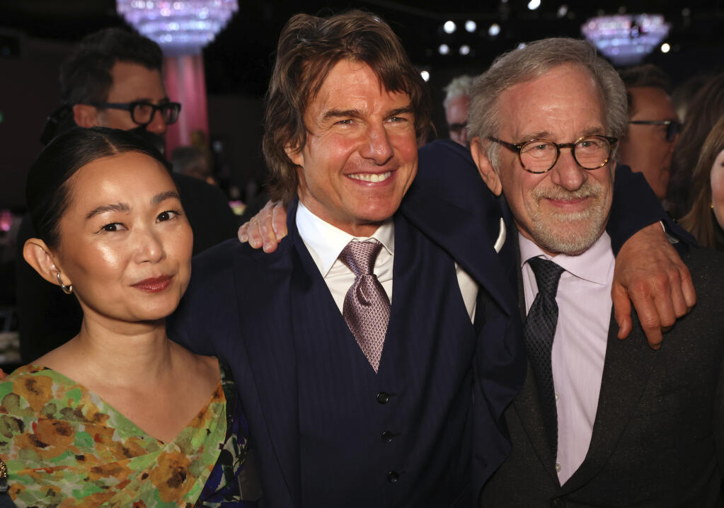 Hong Chau, from left, Tom Cruise, and Steven Spielberg attend the 95th Academy Awards Nominees Luncheon on Monday, Feb. 13, 2023, at the Beverly Hilton Hotel in Beverly Hills, Calif. (Photo by Willy Sanjuan/Invision/AP)