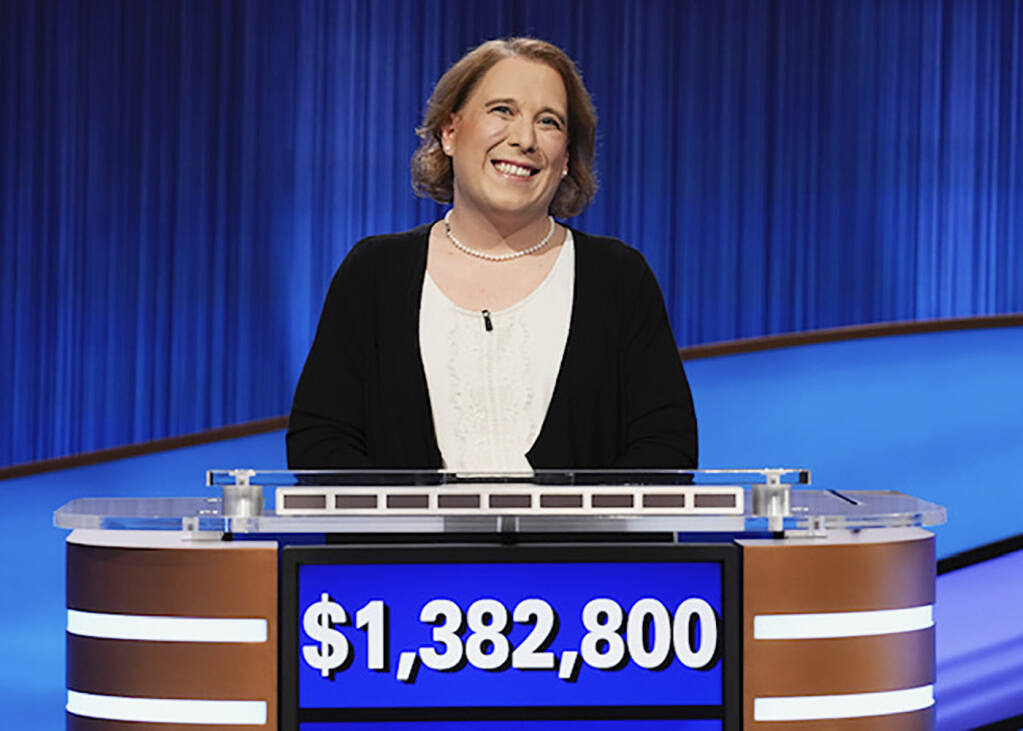 This image released by Sony Pictures Television shows contestant Amy Schneider on the set of "Jeopardy!" After 40 games, Schneider's winning streak has ended. (Casey Durkin/Sony Pictures Television via AP)